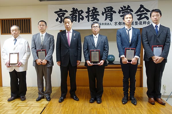 長尾淳彦会長と発表者